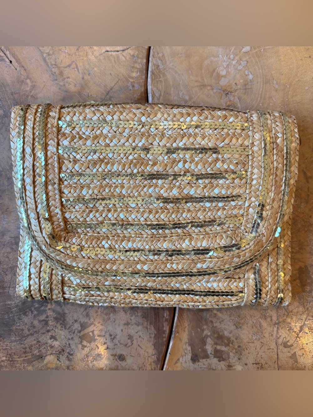 Limited Edition woven Straw and sequins clutch. Great condition.